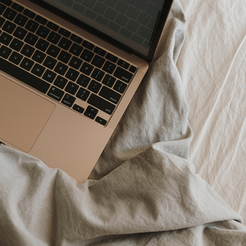 Laptop on a Bed
